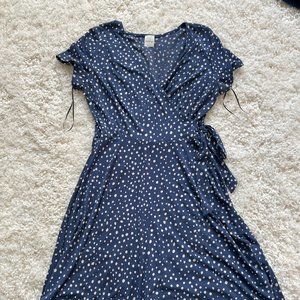 Blue polka dot swing dress with tie accessory